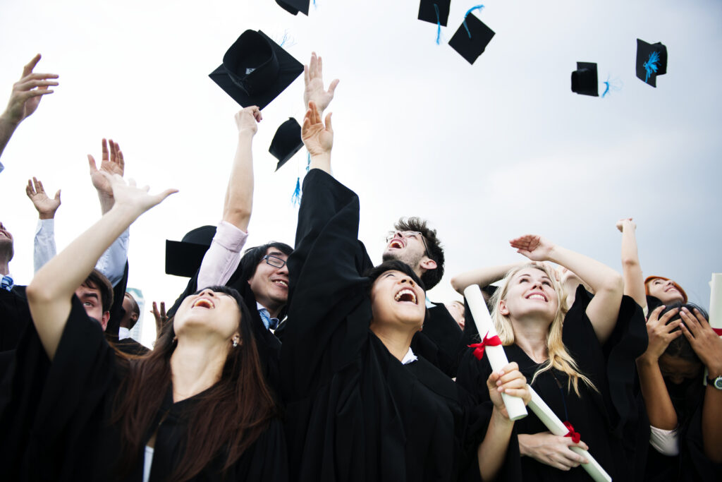Group graduation from Spring college business diploma